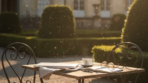 Laptop and coffee left unattended, symbolising stalled progress and overthinking.