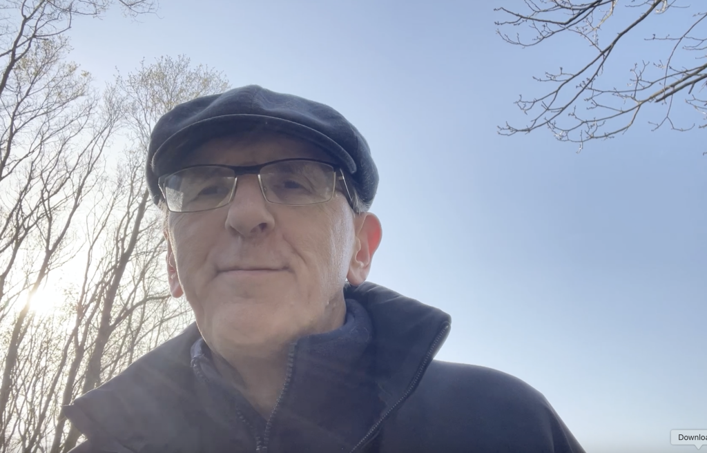 Paul the Dinosaur outdoors talking about becoming a solopreneur after 50 and building digital income without fame